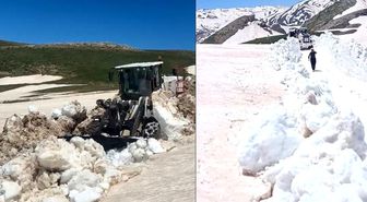 Hakkari'de yaz günü 3 metreyi bulan karda yol açma çalışması