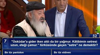 'Üsküdar'a gider iken aldı da bir yağmur. Kâtibimin setresi uzun, eteği çamur.' türküsünde geçen 'setre' ne demektir?