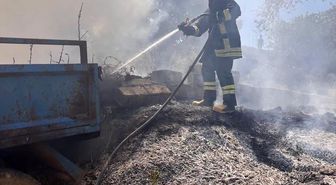 Altınözü'nde bahçede çıkan yangın römorka sıçradı