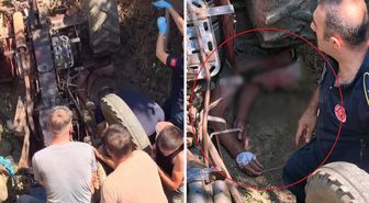 İki torunuyla birlikte traktörün altında kalan dedeyi itfaiye ekipleri kurtardı