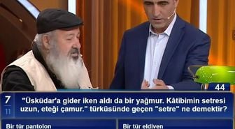 'Üsküdar'a gider iken aldı da bir yağmur. Kâtibimin setresi 11 uzun, eteği çamur.' türküsünde geçen 'setre' ne demektir?