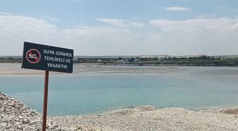 Serinlemek için girdiği çayda kayboldu