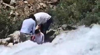 Kanispi Şelalesi'nde korku dolu anlar: Akıntının ortasında kalan çocuk son anda kurtarıldı