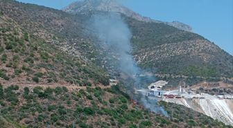 Mersin'de makilik alanda çıkan yangın söndürüldü