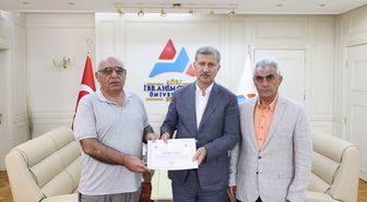 Öğr. Gör. Salim Arpacı kişisel kütüphanesini AİÇÜ'ne bağışladı
