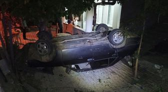 Çarşamba'da takla atan otomobil evin bahçesine girdi