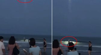Çin'de gece yüzme yasağını çiğnedi, drona yakalandı