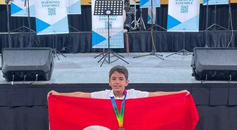 Anamurlu ilkokul öğrencisi Singapur'daki matematik yarışmasında madalya kazandı
