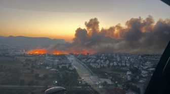 Mersin'de yerleşim yeri yakınında çıkan yangın, büyümeden kontrol alltına alındı