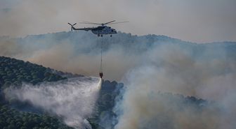 Balıkesir'in Gömeç ilçesindeki orman yangınına müdahale sürüyor