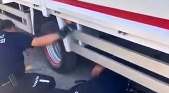 Teker arasına giren kedi ekipler tarafından çıkartıldı