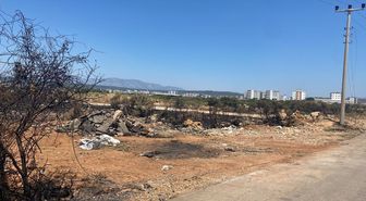 Antalya'da moloz dökerken telleri koparıp yangına neden olan sürücüye 115 bin lira ceza