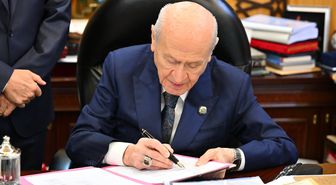 Bahçeli'den tarihi imza: Çerçeve yasa teklifi