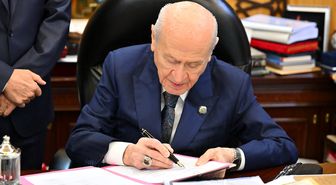 Bahçeli'den çerçeve yasaya imza