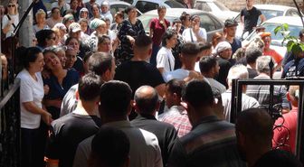 Manisa'da silahlı saldırıda ölen baba-oğul son yolculuğuna uğurlandı