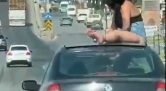 Salihli'de Açılır Tavana Çıkan Kadın ve Sürücü Gözaltında