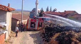 Tavşanlı'da otluk yangını evlere sıçramadan söndürüldü