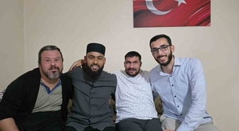 Down sendromlu Savaş, ilahici Celal Karature ile buluştu