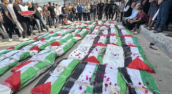 Gazze'de 100 Filistinli için toplu cenaze töreni