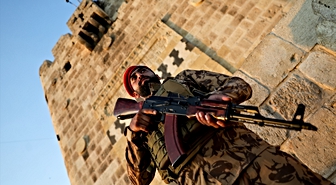 Suriye'nin Halep kentinde, iç savaşta yaralananlar ve asker yakınları onurlandırıldı