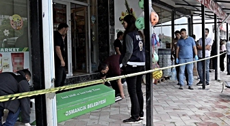 Eşini çalıştığı markette öldürüp aynı silahla intihar etti