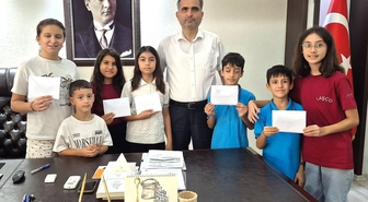 Kozan’da miniklerden afetzedelere 15 bin liralık destek