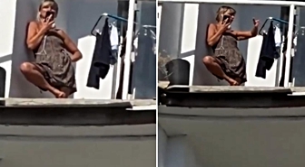 Bina bombaların hedefi oldu, genç kadın hiçbir şey olmamış gibi davrandı