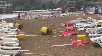 Alanya'da fırtına, İncekum Plajı'nda şezlong ve şemsiyeleri metrelerce sürükledi