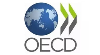 OECD, 2026 küresel büyüme tahminini 2,9'a çıkarırken enflasyonda artış öngördü