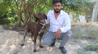Adana Sarıçam'da komşu, çiftçinin köpeğini sopayla darbetti; olay kameraya yansıdı