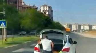 Diyarbakır Yenişehir'de çocuk bagaj kapısında, kişi malzemeyle bagajda görüntülendi