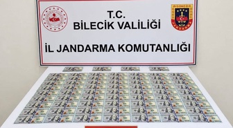 Bilecik'te jandarmanın durdurduğu araçta 202 sahte Amerikan doları bulundu