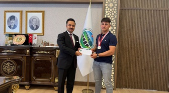 Nurdağı Kaymakamı Erciyas, 77 kiloda Gaziantep birincisi halterci Kalkan'ı ağırladı