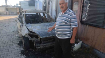 Antakya'da konteyner kentte otomobilin çalınmak istenirken yandığı iddia edildi