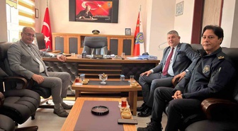 Bolvadin Kaymakamı, Balıkesir'e tayini çıkan Emniyet Müdürü Arıkan'ı ziyaret etti