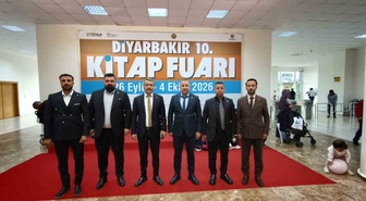 MHP Diyarbakır İl Başkanı Özcoşkun, 10. Kitap Fuarı'nı yönetimle ziyaret etti