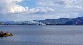Muğla'da Köyceğiz ile Ortaca arasındaki sazlıkta çıkan yangın büyümeden söndürüldü