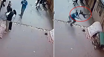 Pencereden düşen çocuğu son anda yakaladı