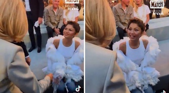 Kendisine selam veren Brigitte Macron karşısında ayağa kalkmayan şarkıcıya tepki