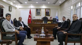 Elazığ Gençlik ve Spor İl Müdürü Eren, Keban Kaymakamı Onur'a ziyarette bulundu