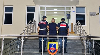 İzmir Dikili'de 11 ayrı suçtan 27 yıl 7 ay hapis cezası olan şahıs yakalandı