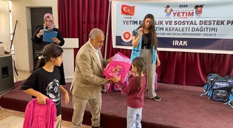 TDV, Kerkük'te 150 yetim çocuğa okul kıyafeti, kırtasiye ve maddi yardımda bulundu