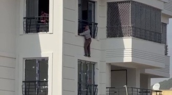 Adıyaman'da metrelerce yüksekte güvenlik önlemi almadan çalışan şahıs endişelendirdi