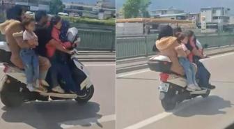 Motosikletle tehlikeli yolculuk! Otomobile bile bu kadar kişi binemiyor