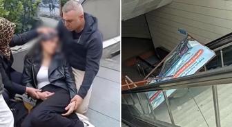 Metro istasyonunda yürüyen merdivenlerde reklam panosu genç kadının üzerine düştü