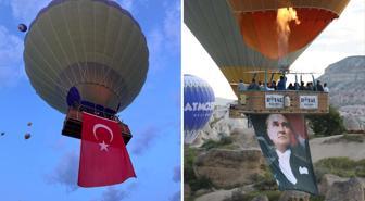 Kapadokya'da gökyüzü Türk bayrakları ve Atatürk posterleriyle süslendi