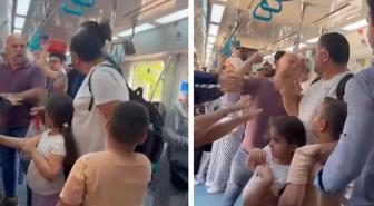 Marmaray'da iki küçük çocuğunun yanında darbedildi