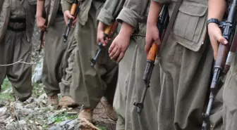 PKK'lı teröristler silahlarını içinde ateş yanan kazana atacak