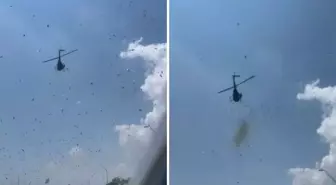 Ölen adamın vasiyeti şaşırttı! Cenazesinde helikopterden para yağdırıldı
