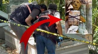 Mezarda bal mumundan yapılmış bebek ve bebeğe sarılı muska bulundu